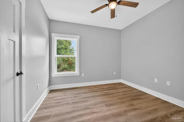 wooden floor and an entryway in a room