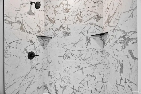 a view of a room with racks on the wall