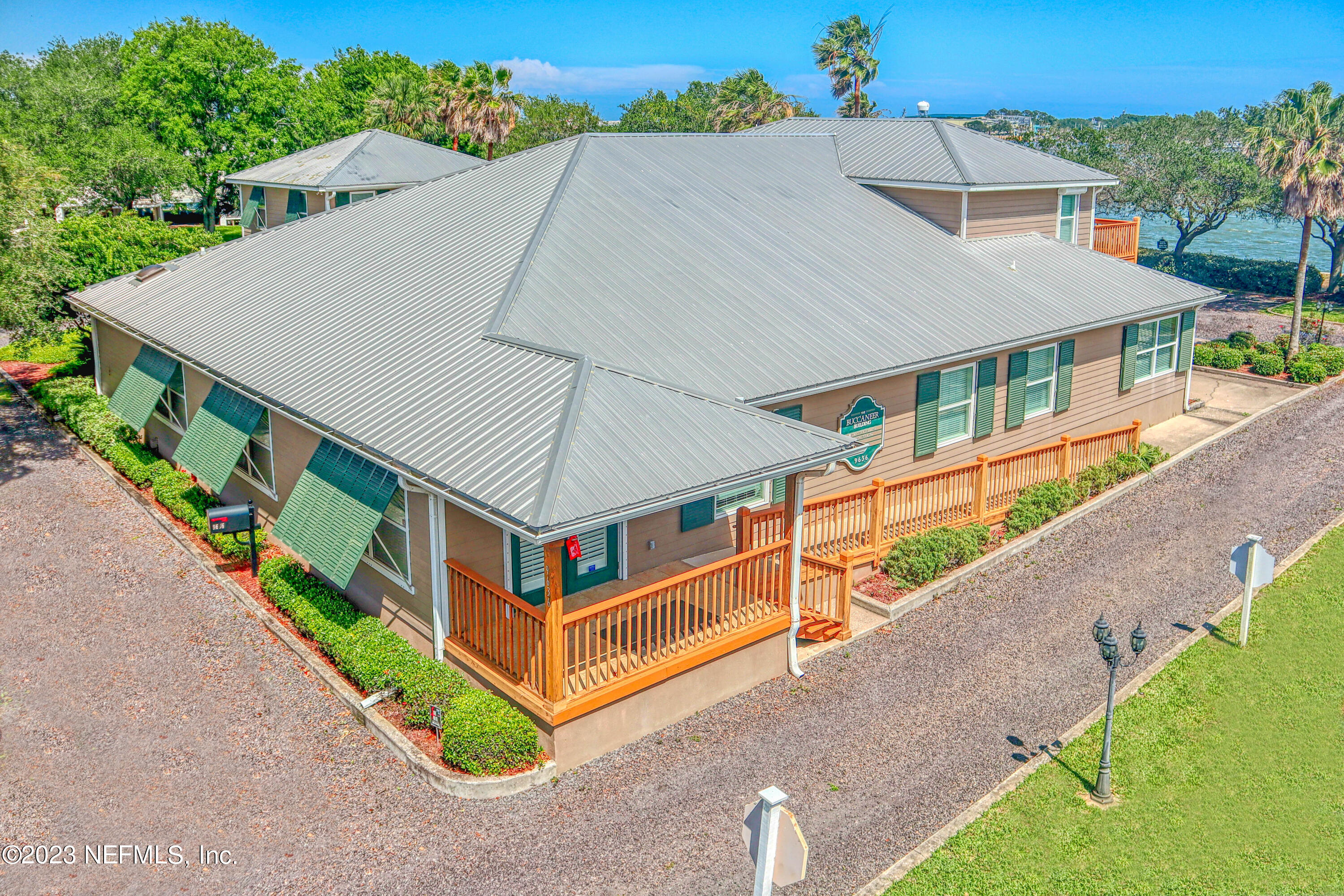 9636 Heckscher Drive Jacksonville, FL 32226 - Photo 1 of 43 an aerial view of a house with a yard and potted plants