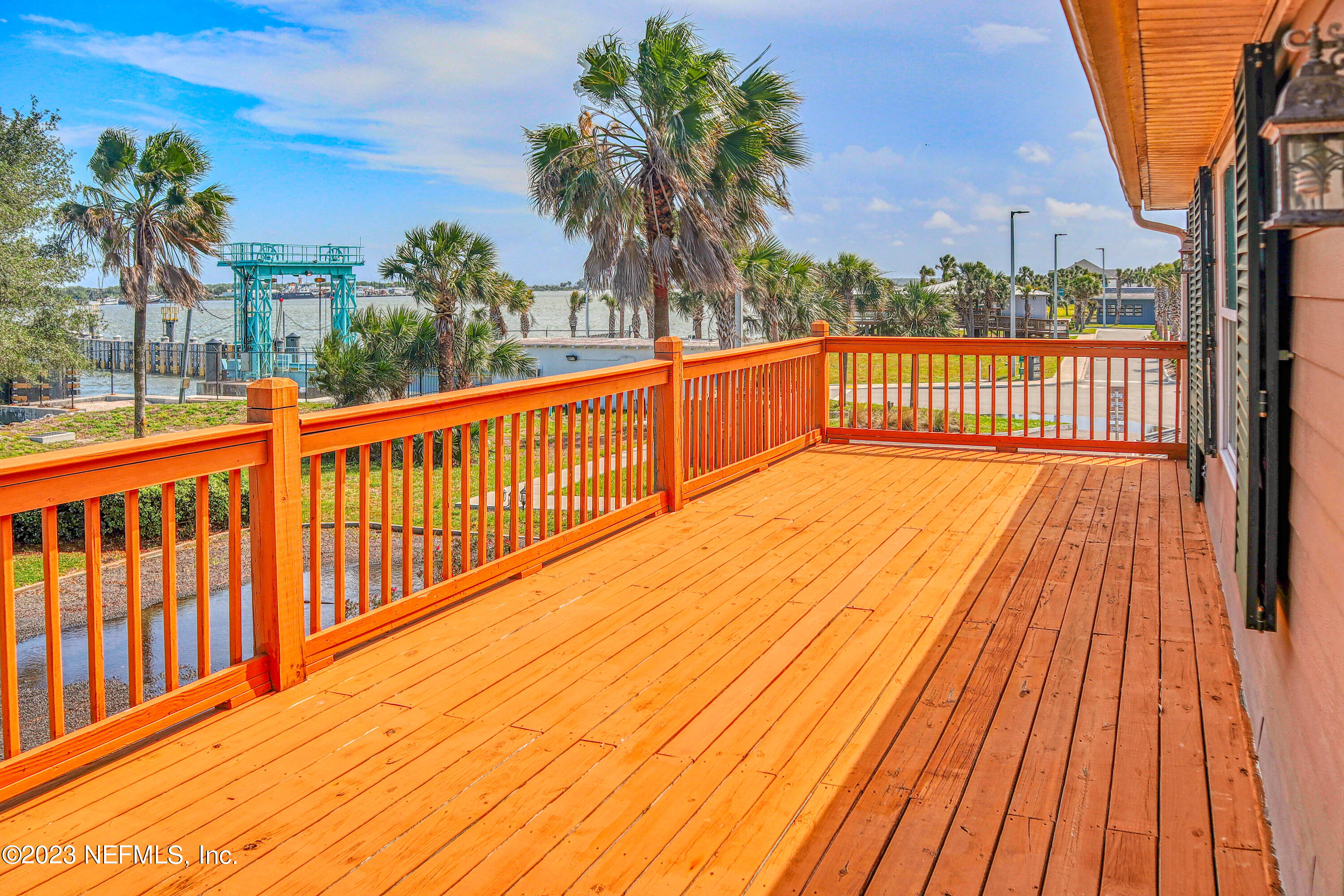 9636 Heckscher Drive Jacksonville, FL 32226 - Photo 17 of 43 a view of deck with a palm trees