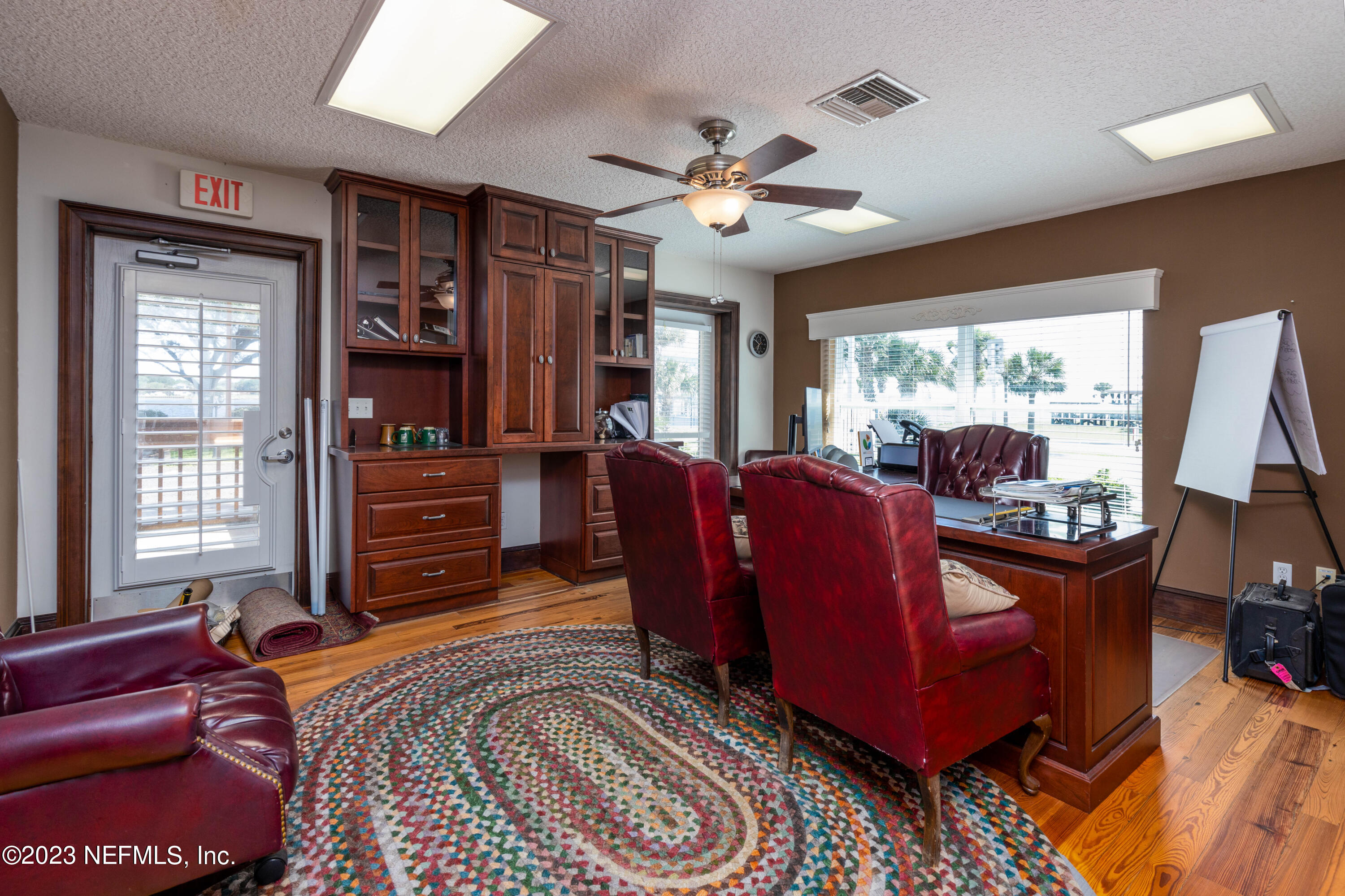 9636 Heckscher Drive Jacksonville, FL 32226 - Photo 29 of 43 a living room with furniture and a large window