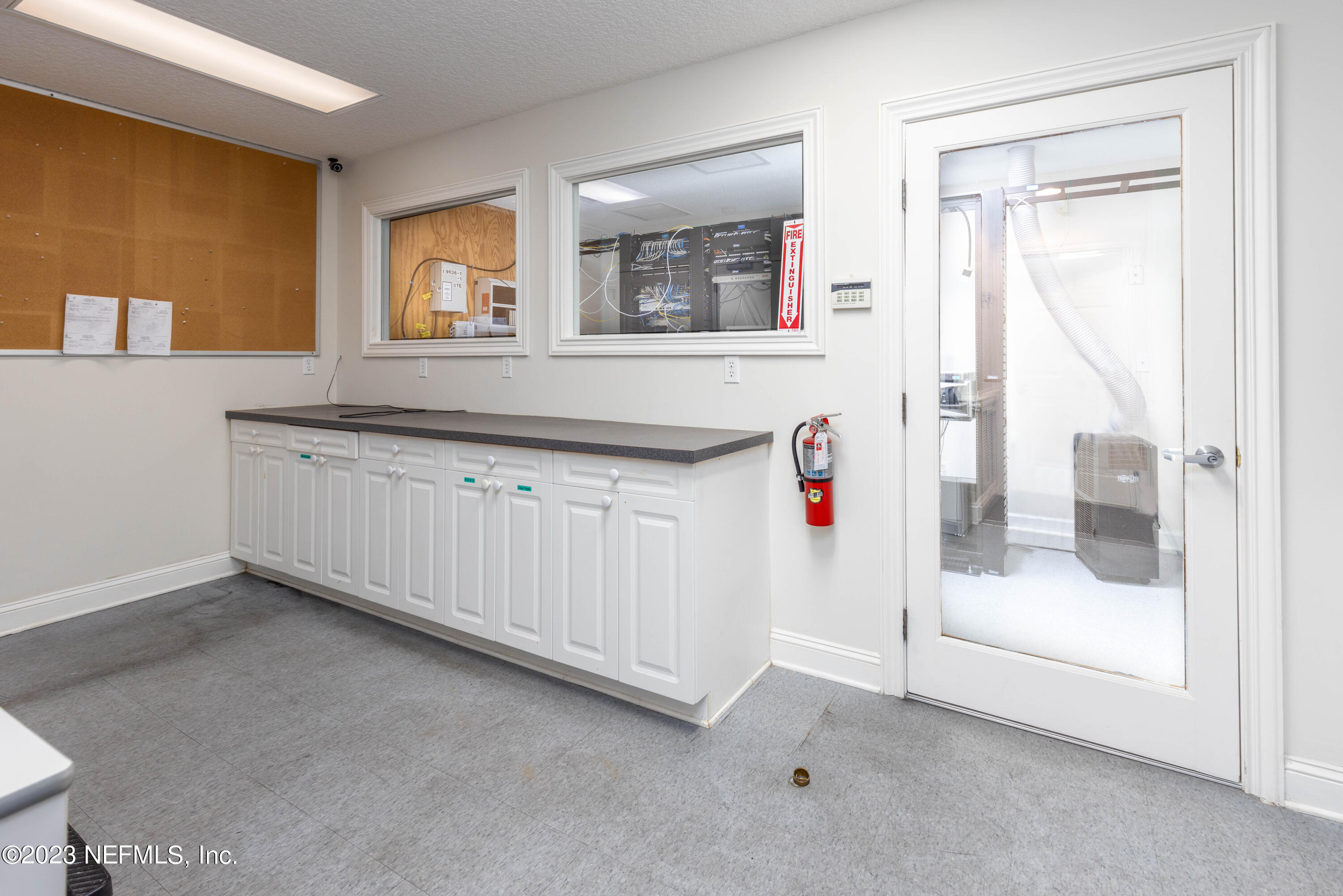 9636 Heckscher Drive Jacksonville, FL 32226 - Photo 39 of 43 a bathroom with a granite countertop sink and a mirror