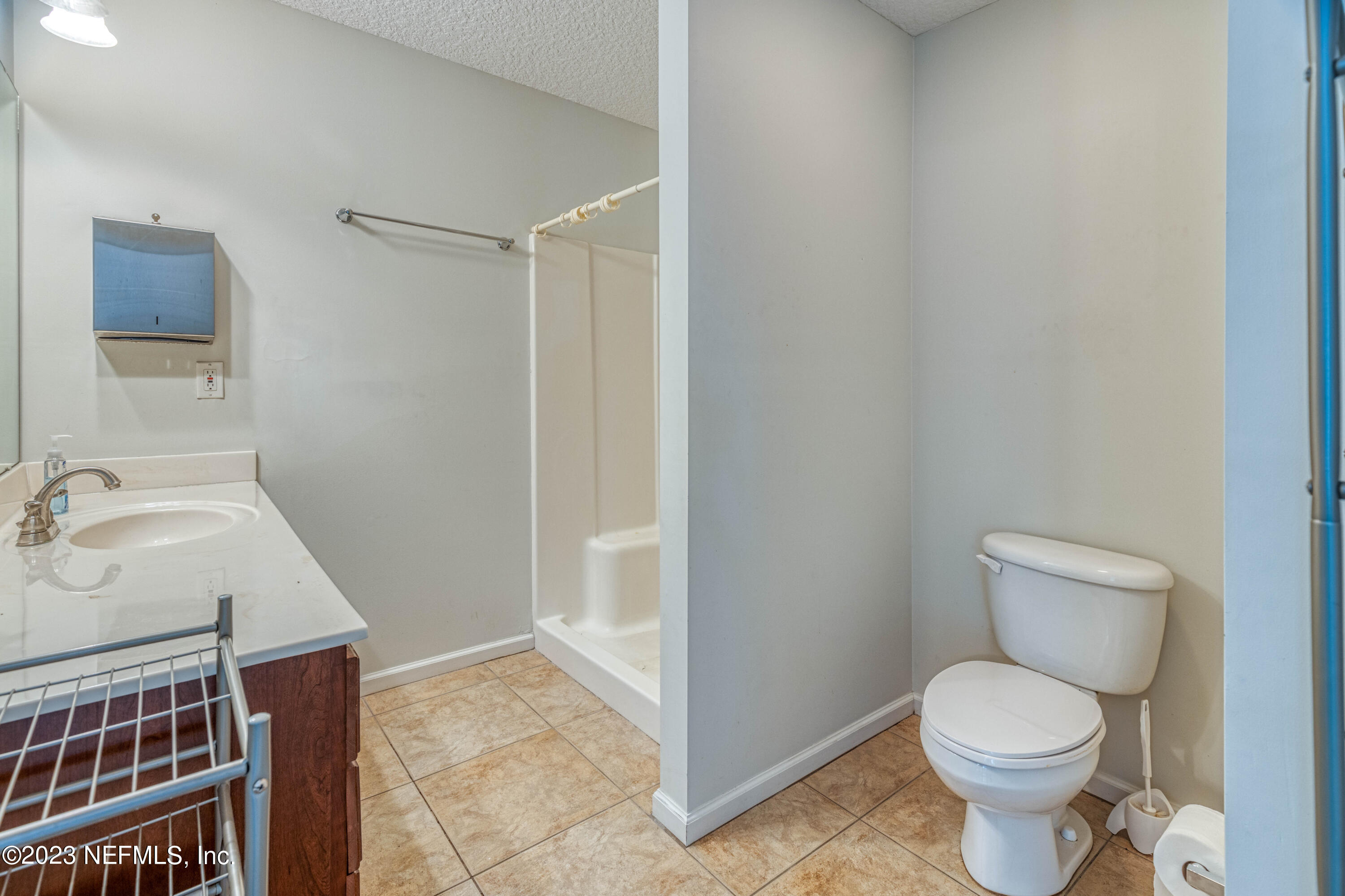 9636 Heckscher Drive Jacksonville, FL 32226 - Photo 42 of 43 a bathroom with a toilet and a sink