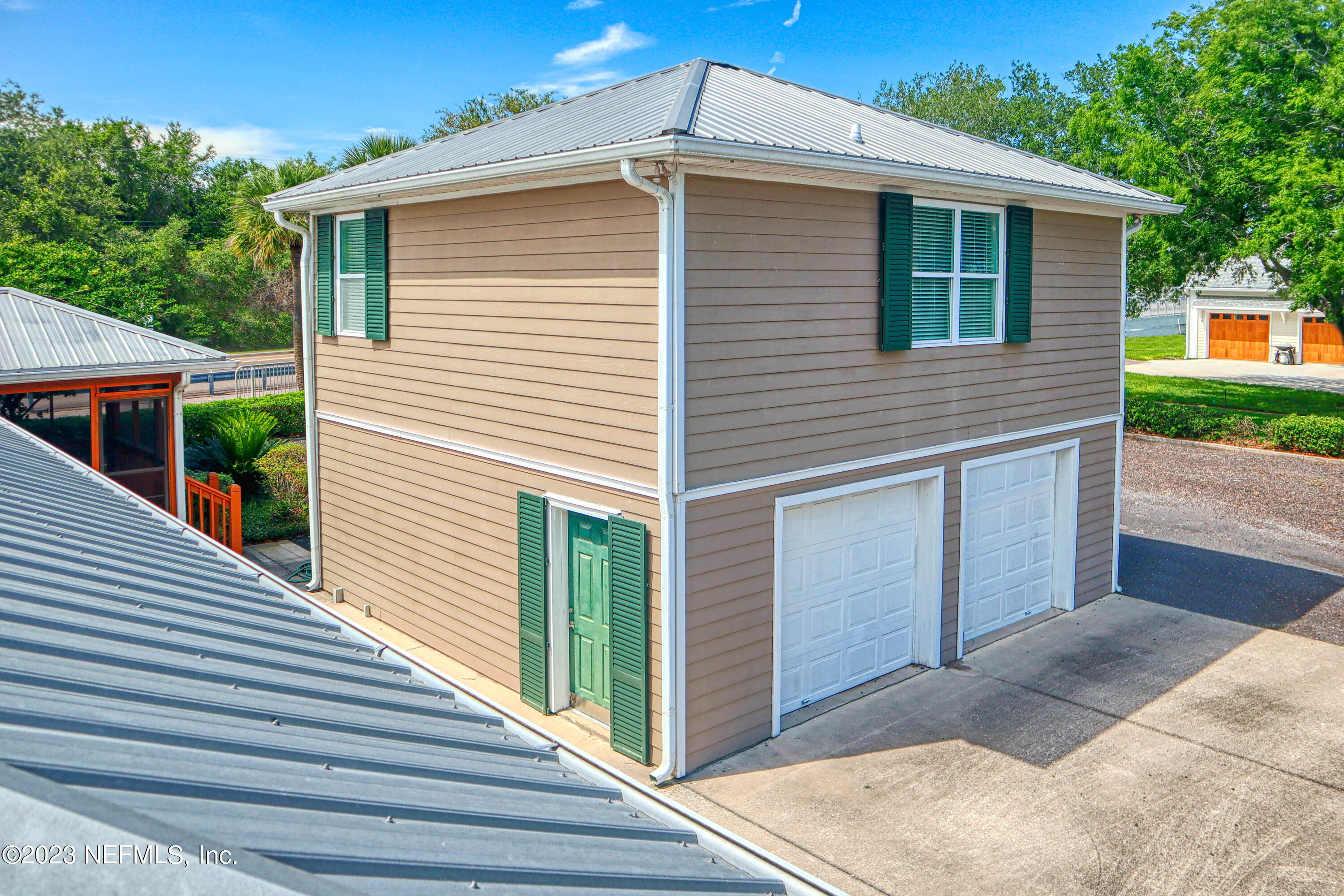 9636 Heckscher Drive Jacksonville, FL 32226 - Photo 9 of 43 a view of a house with a yard