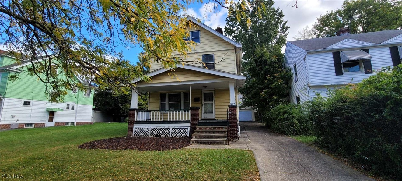 927 Yellowstone Road Cleveland Heights, OH 44121 - Photo 1 of 13 View of front of house featuring a porch and a front yard
