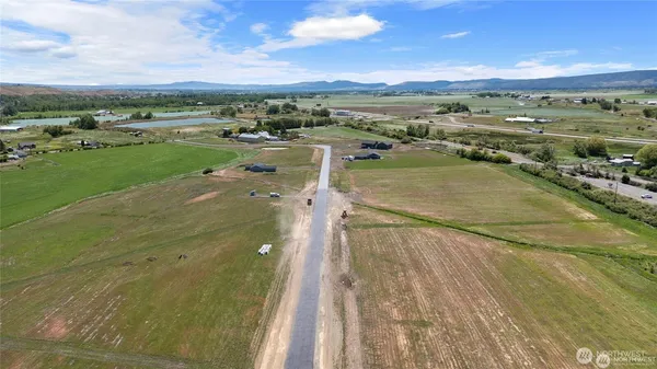 a view of a lake with a yard