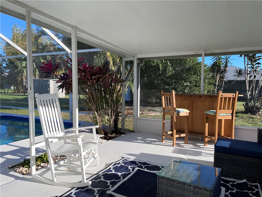 810 Southwest Commonwealth Road Port St. Lucie, FL 34953 - Photo 3 of 21 a view of outdoor space and patio