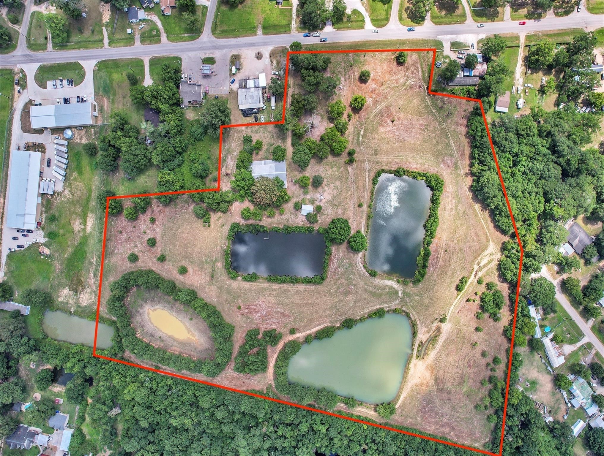 11304 Fostoria Road Cleveland, TX 77328 - Photo 32 of 32 an aerial view of a house