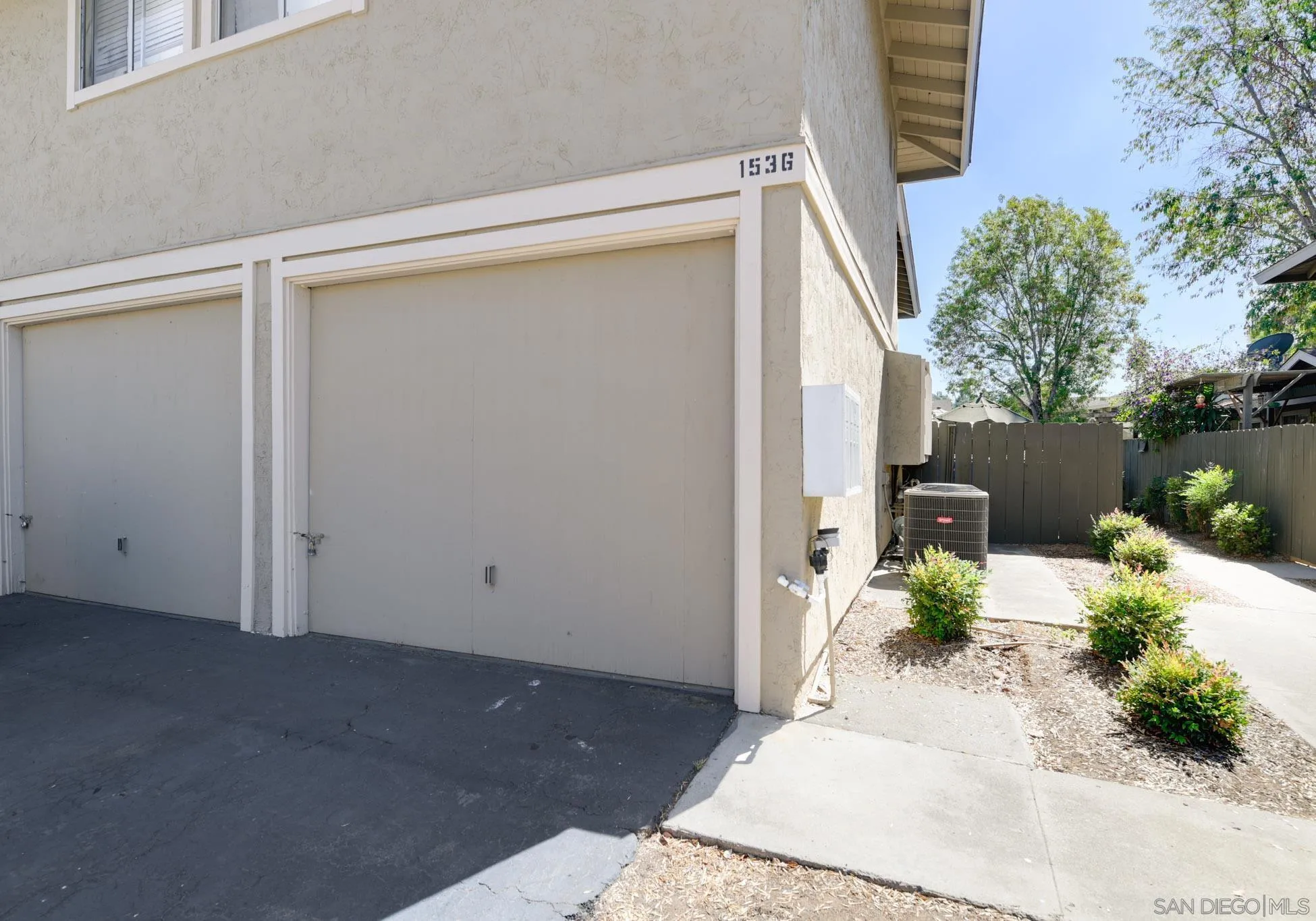 1536 Gustavo Street, Unit A El Cajon, CA 92019 - Photo 25 of 28 a potted plant sitting in front of a house