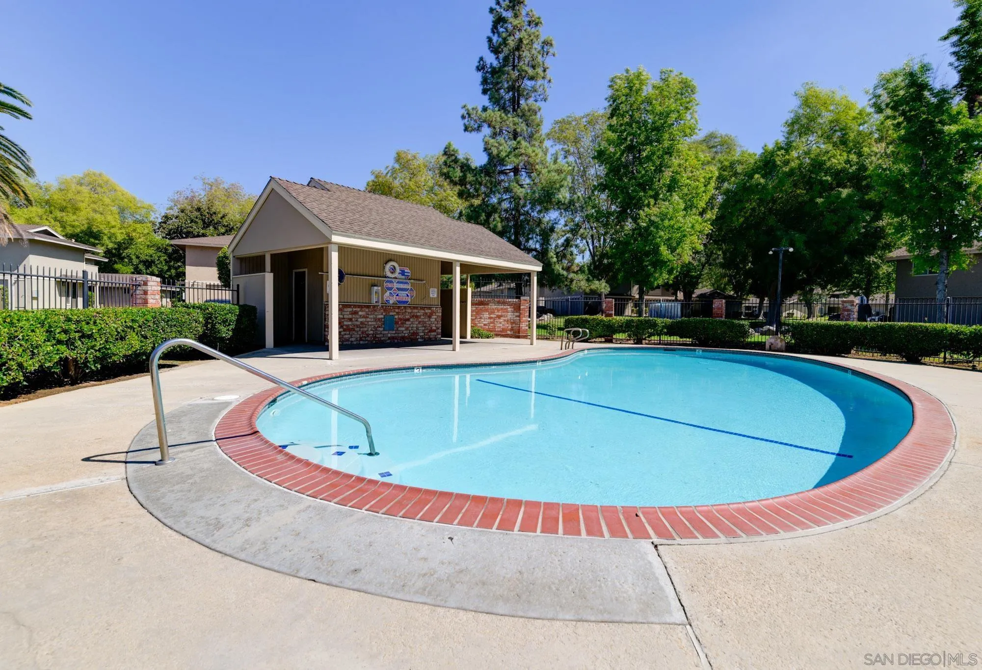 1536 Gustavo Street, Unit A El Cajon, CA 92019 - Photo 27 of 28 a view of a house with swimming pool and porch