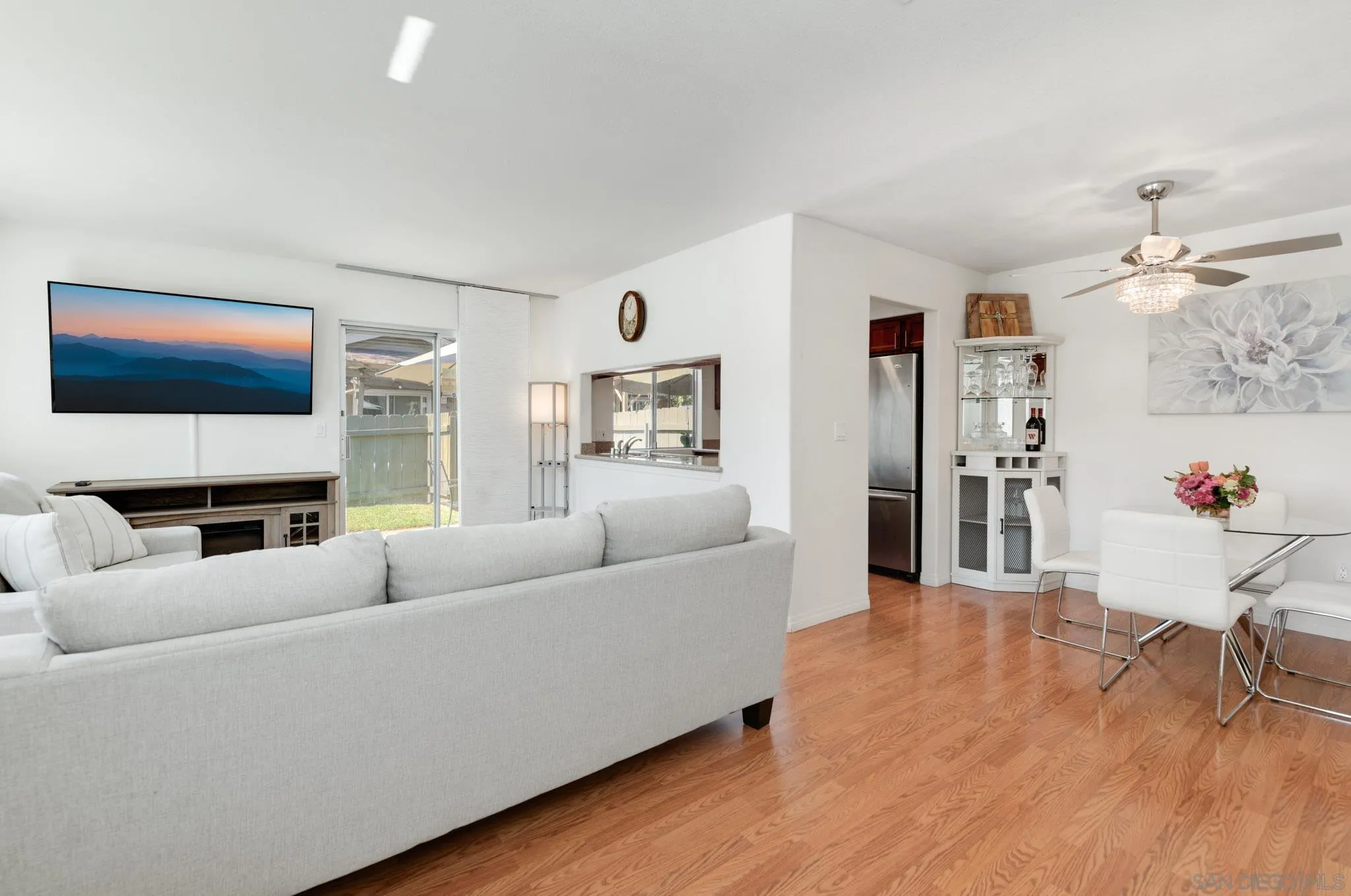 1536 Gustavo Street, Unit A El Cajon, CA 92019 - Photo 5 of 28 a living room with furniture and a flat screen tv