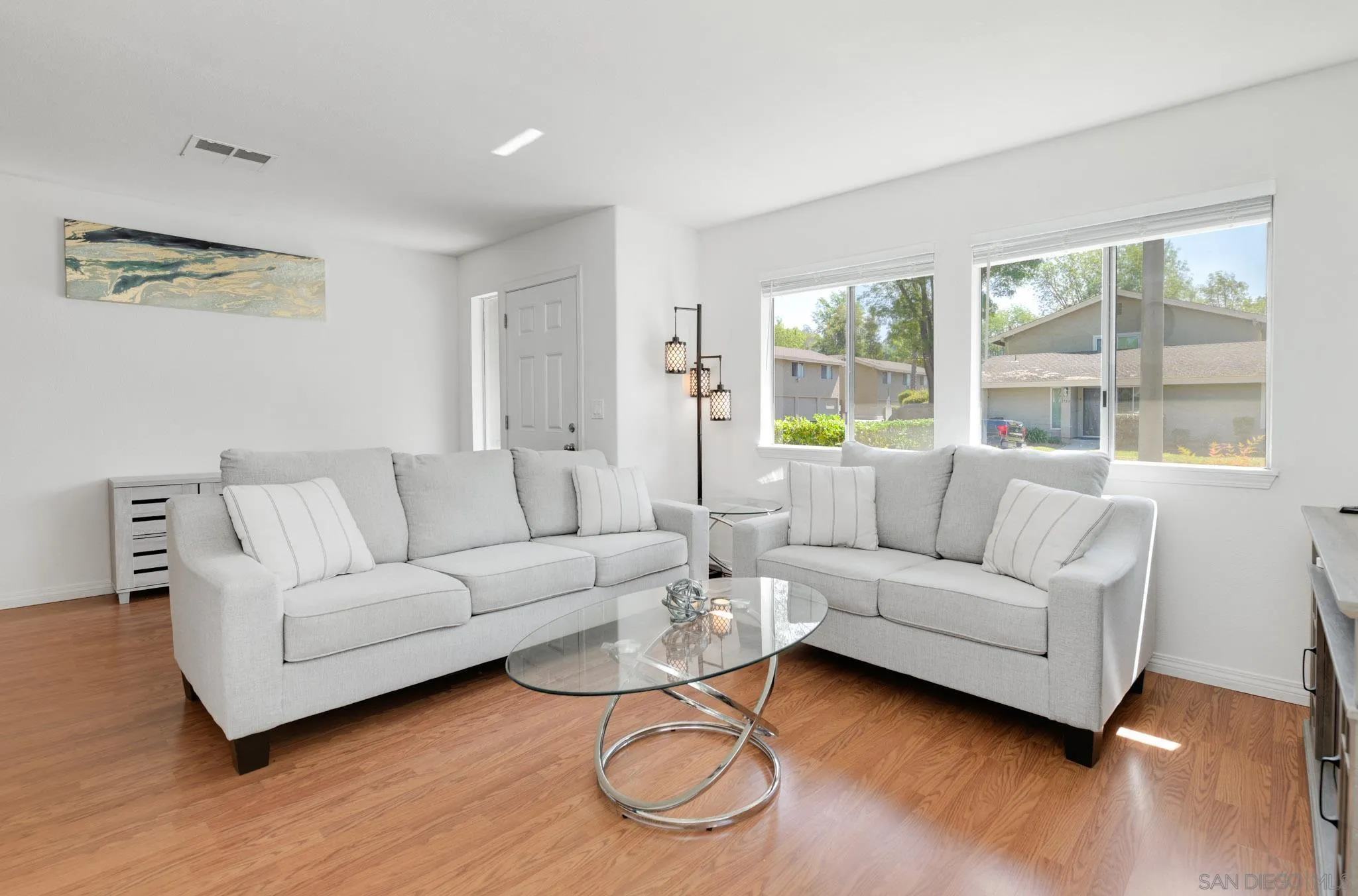1536 Gustavo Street, Unit A El Cajon, CA 92019 - Photo 8 of 28 a living room with furniture and a large window