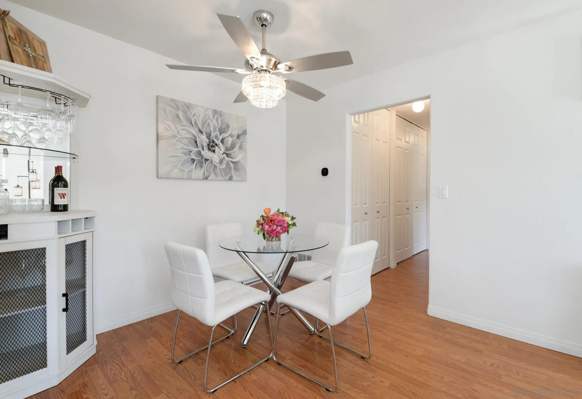 1536 Gustavo Street, Unit A El Cajon, CA 92019 - Photo 10 of 28 a view of a dining room with furniture and wooden floor