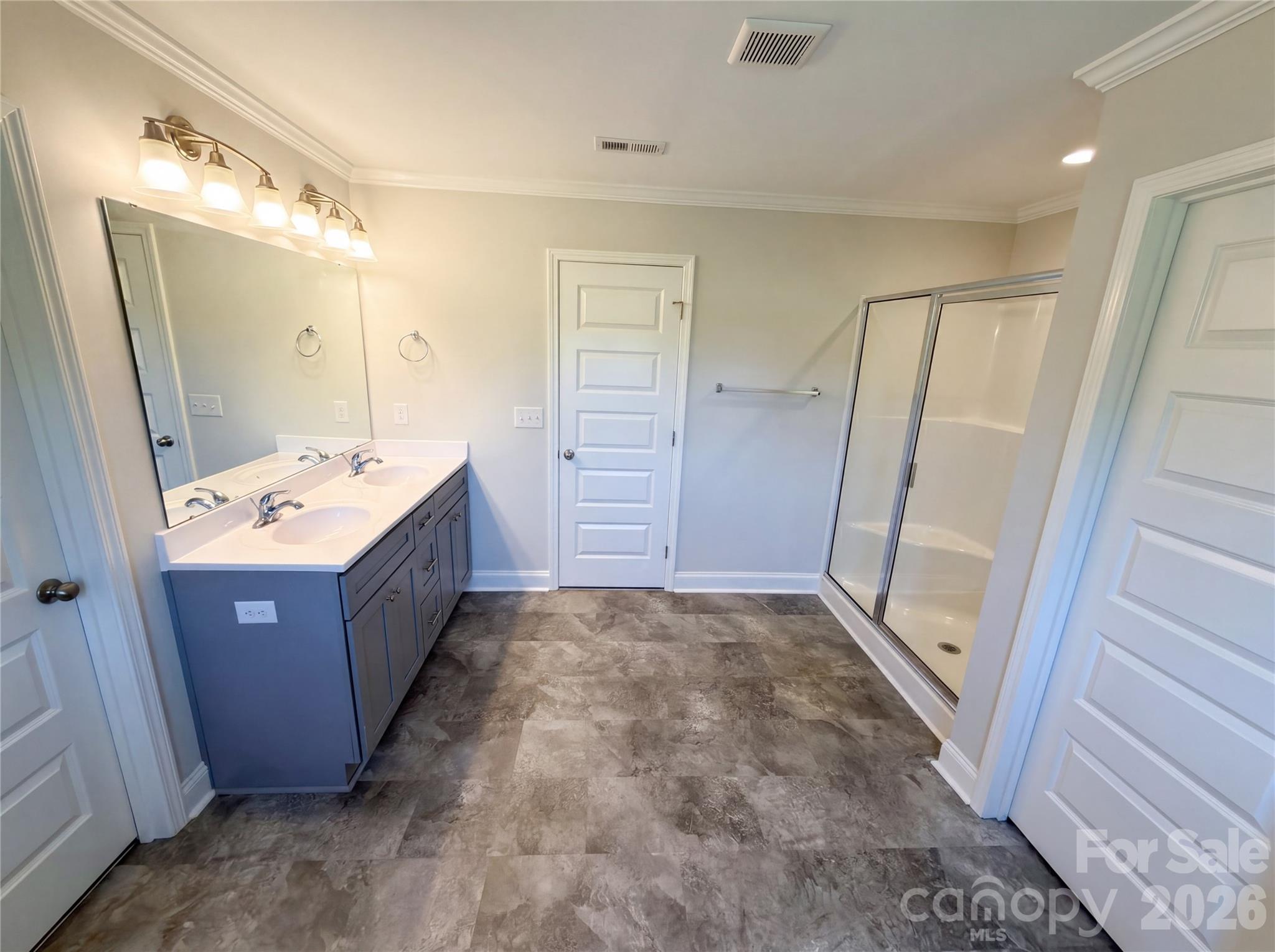 4918 Griffith Road Monroe, NC 28112 - Photo 13 of 17 a bathroom with a tub a sink and a mirror