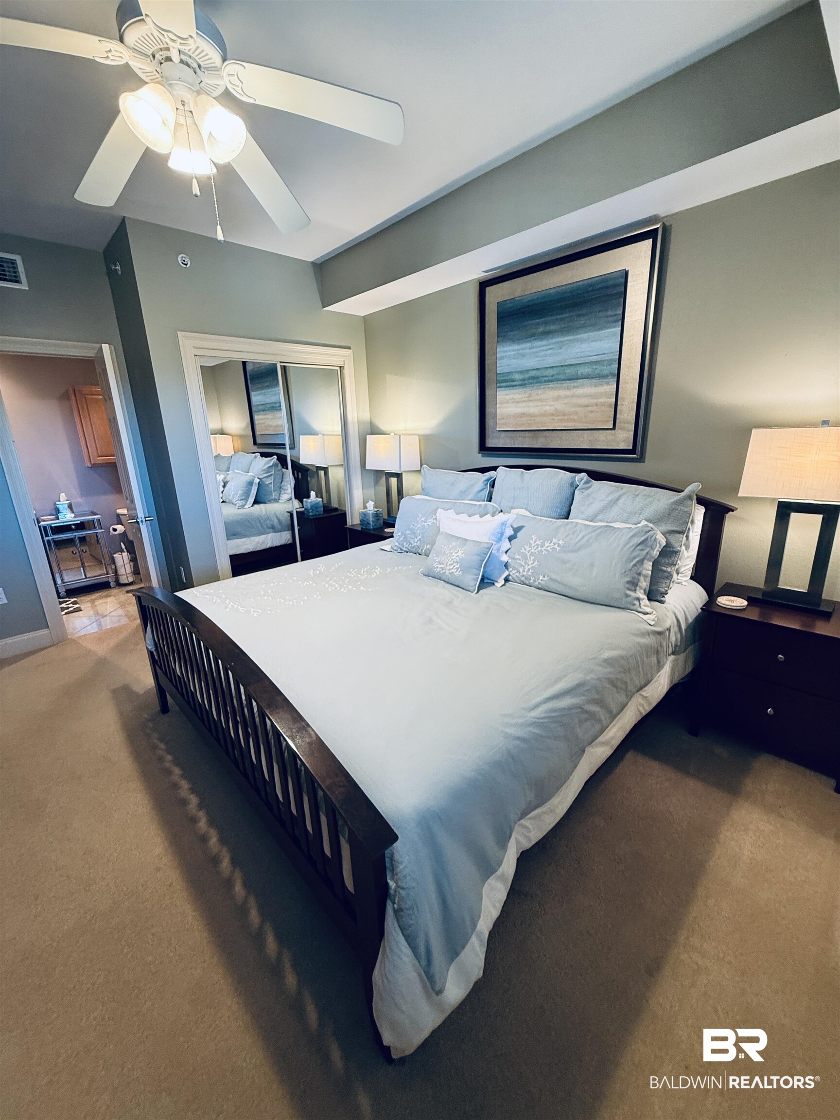 27800 Canal Road, Unit 409 Orange Beach, AL 36561 - Photo 10 of 22 Carpeted bedroom with a closet and a ceiling fan