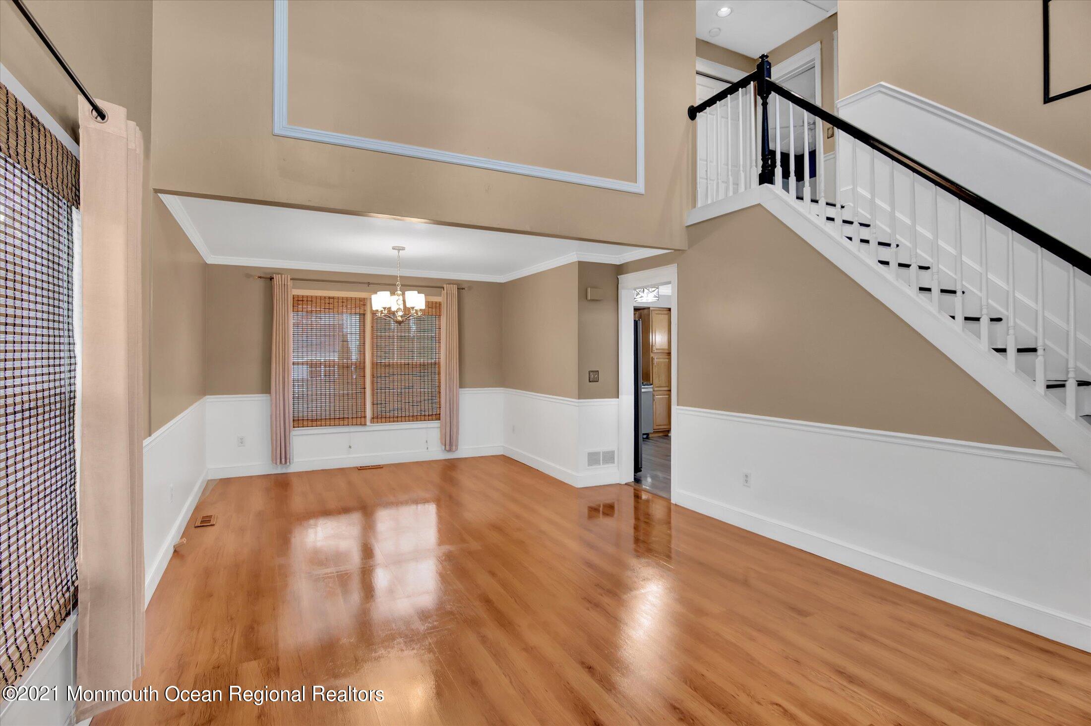 204 Schooner Road Manahawkin, NJ 08050 - Photo 5 of 34 a view of an entryway with wooden floor