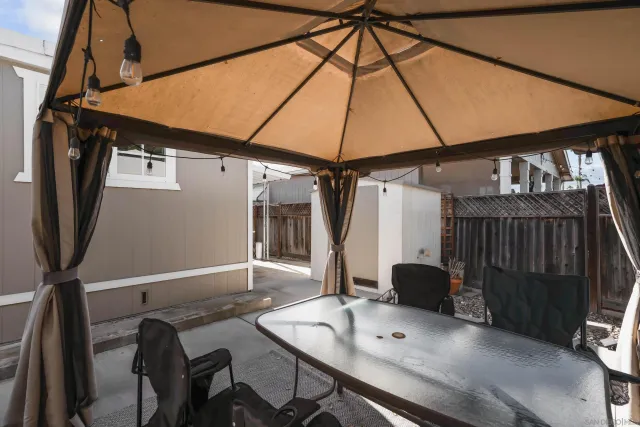 a table and chairs in a patio