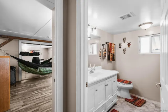 a bathroom with a sink and a toilet