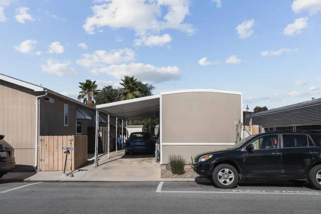 a car parked in front of a house