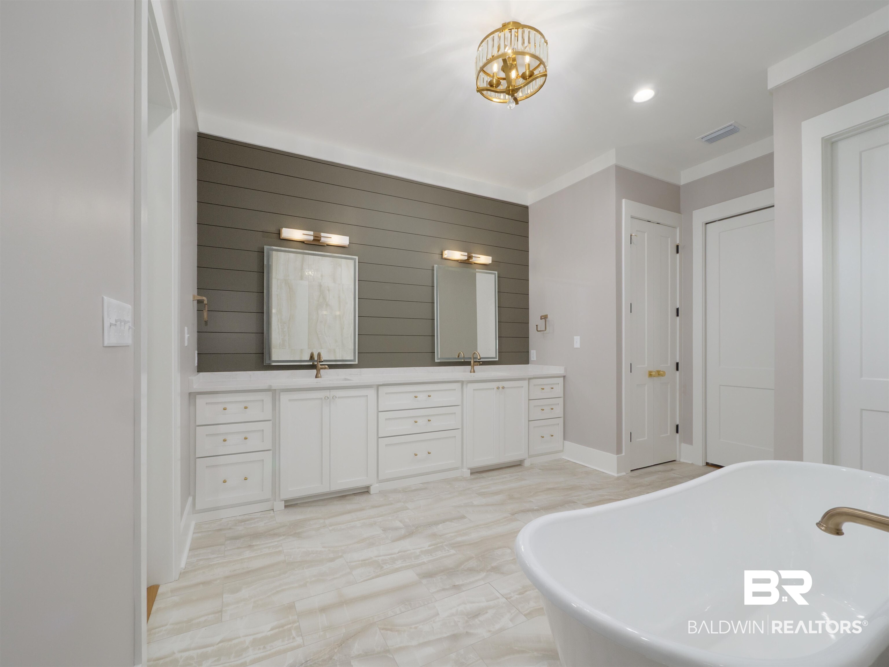 10912 Catania Avenue Fairhope, AL 36532 - Photo 19 of 54 Primary bathroom with a dual vanity and mirrors with built in lights