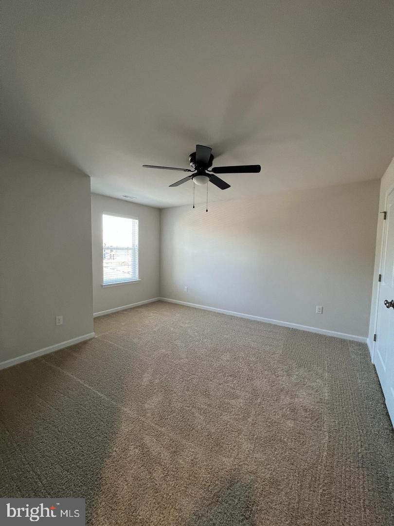 34 Roberta Wy. Medford, NJ 08055 - Photo 11 of 19 a view of an empty room with a window