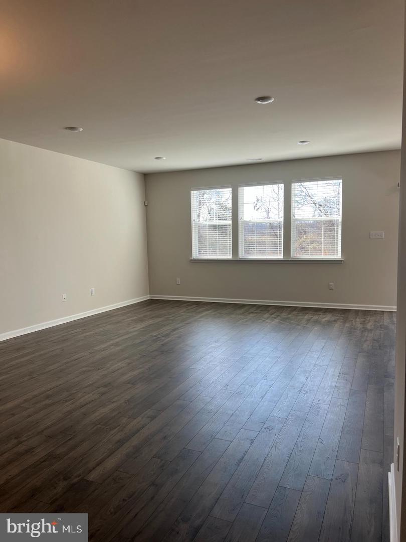 34 Roberta Wy. Medford, NJ 08055 - Photo 14 of 19 an empty room with wooden floor and windows