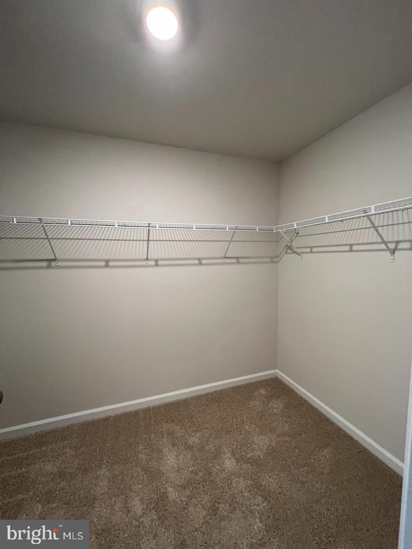 34 Roberta Wy. Medford, NJ 08055 - Photo 16 of 19 a view of a room with racks on the wall