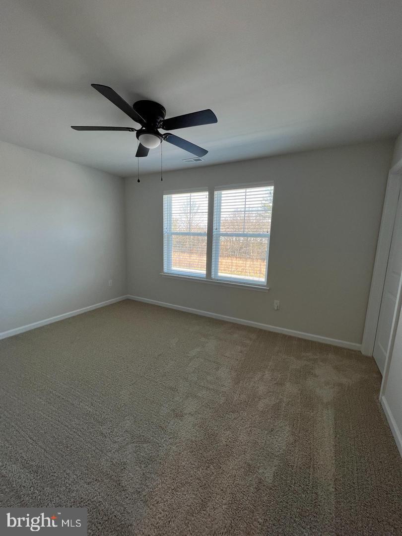 34 Roberta Wy. Medford, NJ 08055 - Photo 10 of 19 an empty room with windows and fan