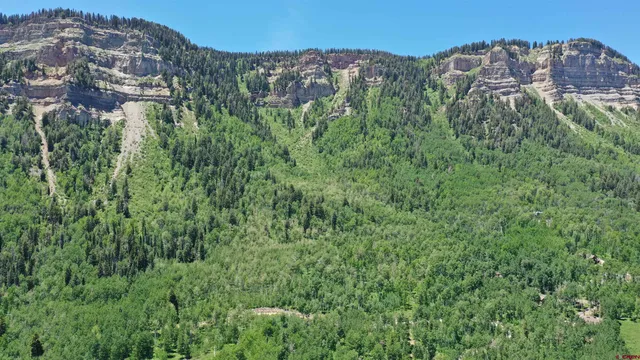 view of a city with tall buildings in the background