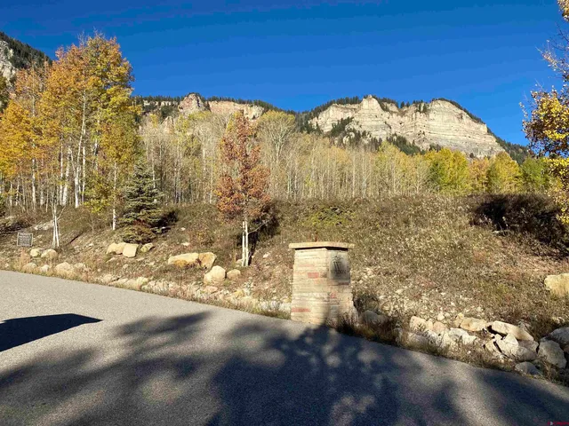 a view of a yard with mountain view