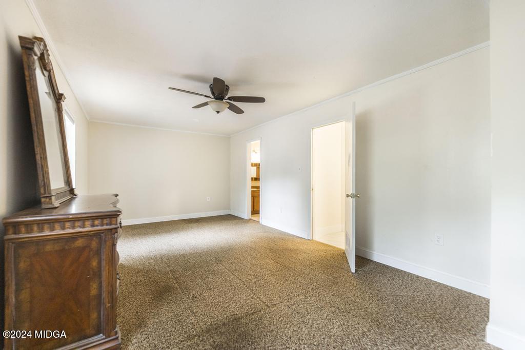 1400 Smith Chapel Road Musella, GA 31066 - Photo 13 of 28 a view of a room with a ceiling fan