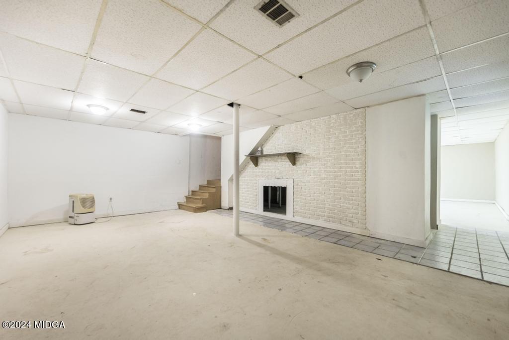 1400 Smith Chapel Road Musella, GA 31066 - Photo 22 of 28 a view of an empty room with a fireplace