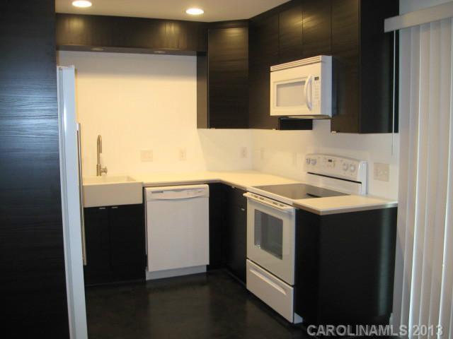 2628 B Park Road Charlotte, NC 28209 - Photo 2 of 6 a utility room with a sink washer and dryer
