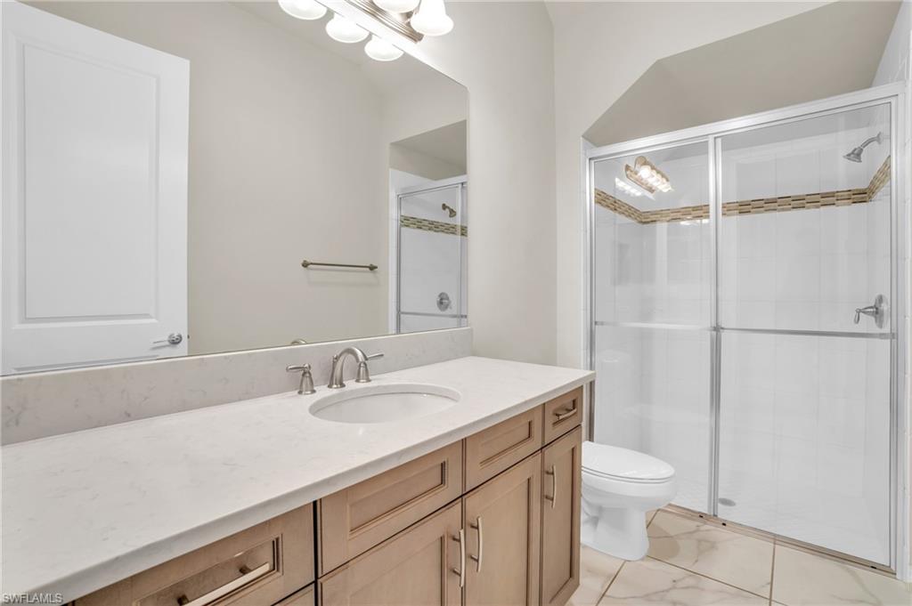 4420 Aurora Street Naples, FL 34119 - Photo 23 of 50 Bathroom 2 Full bath on the main floor