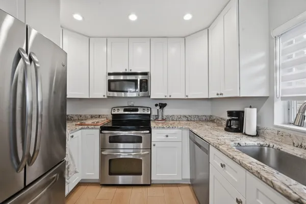 $349,999 | 324 Orange Tree Drive, Unit 4, Atlantis, FL 33462