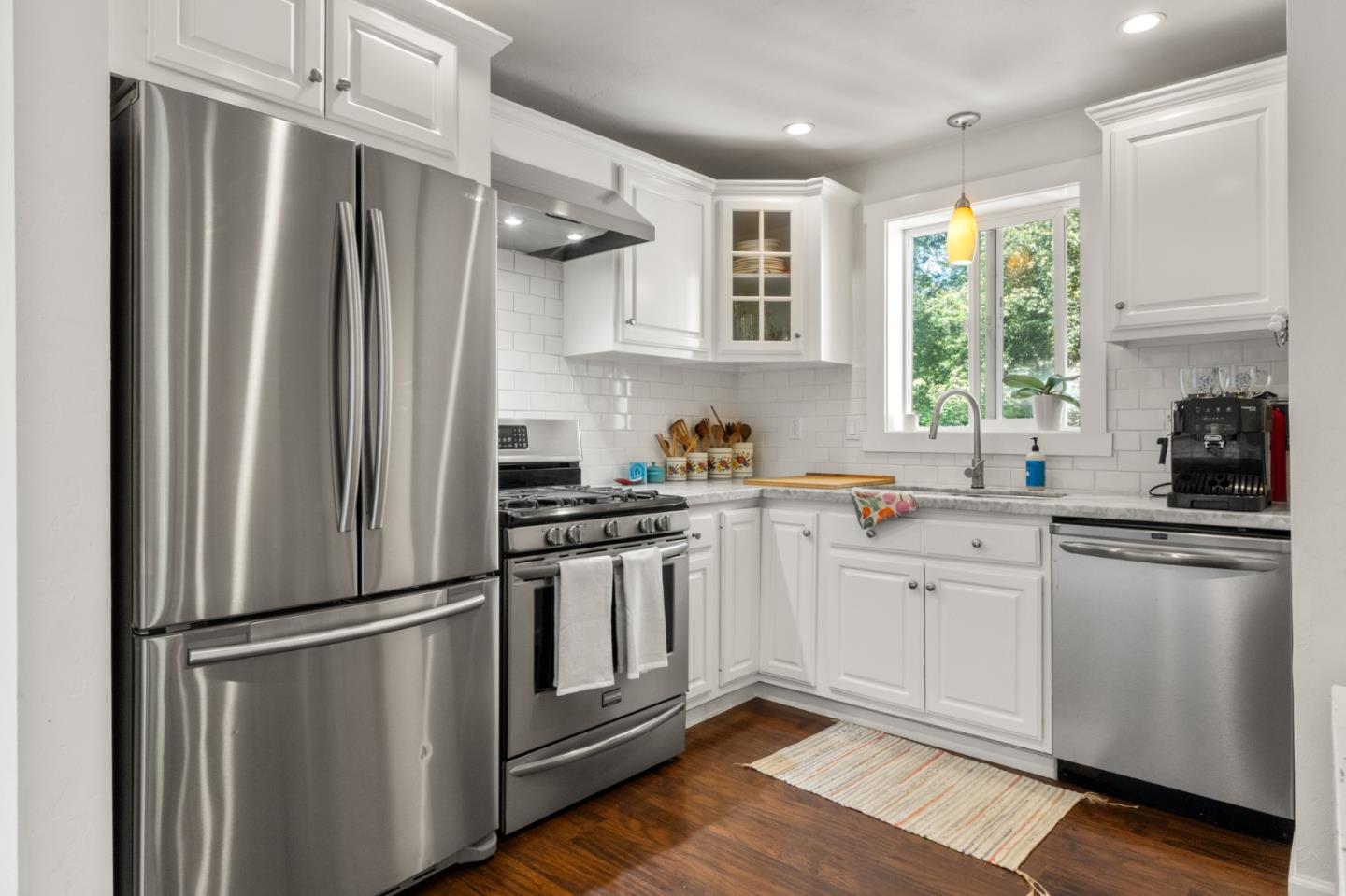 140 Baker Road Aptos, CA 95003 - Photo 17 of 62 a kitchen with stainless steel appliances a refrigerator sink and cabinets