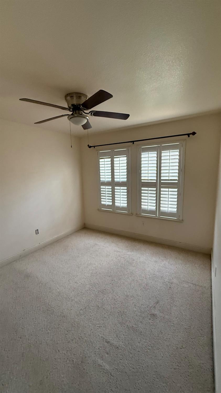 1416 San Rafael Street Los Banos, CA 93635 - Photo 16 of 21 a view of an empty room with a window