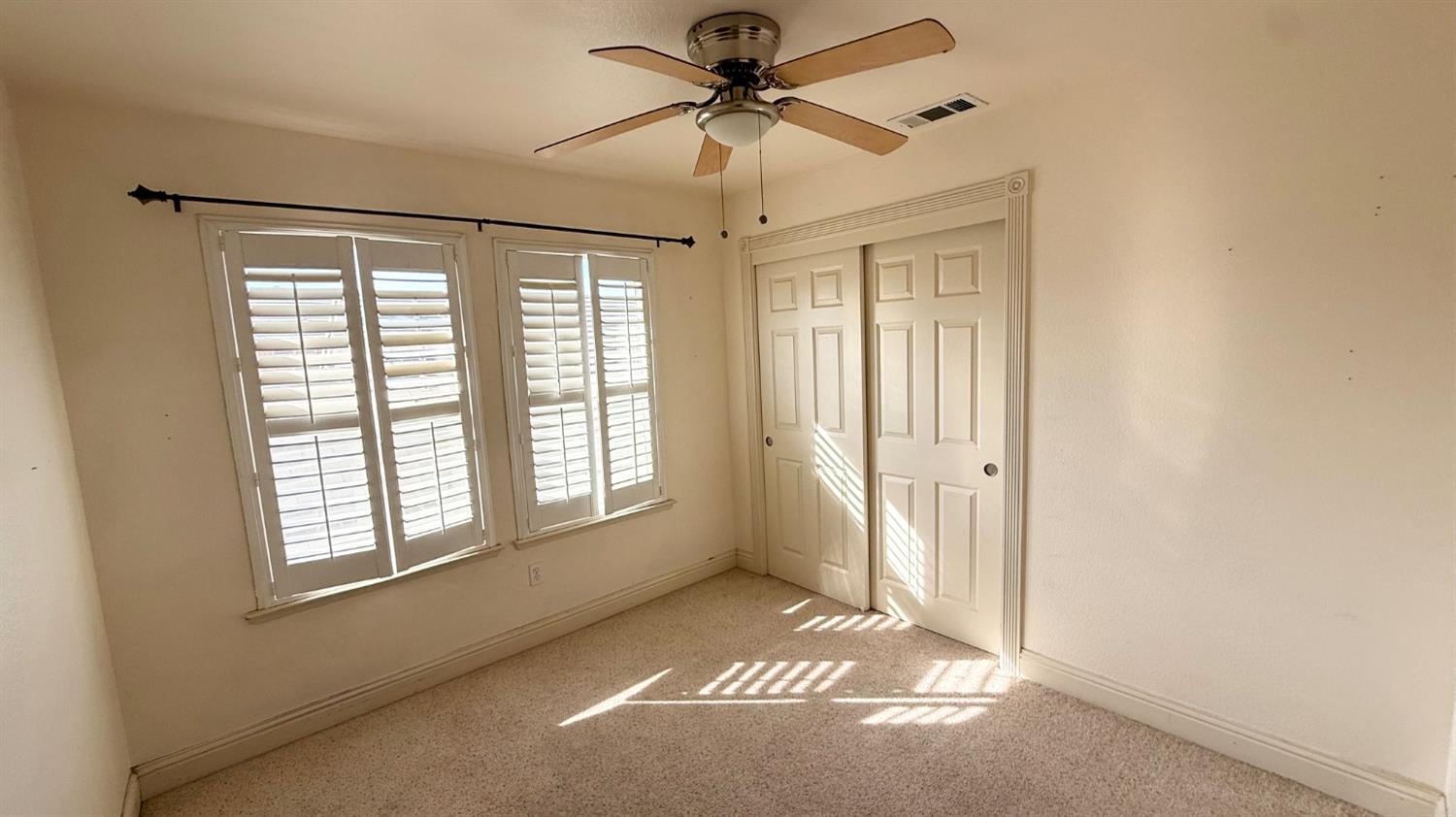 1416 San Rafael Street Los Banos, CA 93635 - Photo 17 of 21 a view of livingroom with window and a ceiling fan
