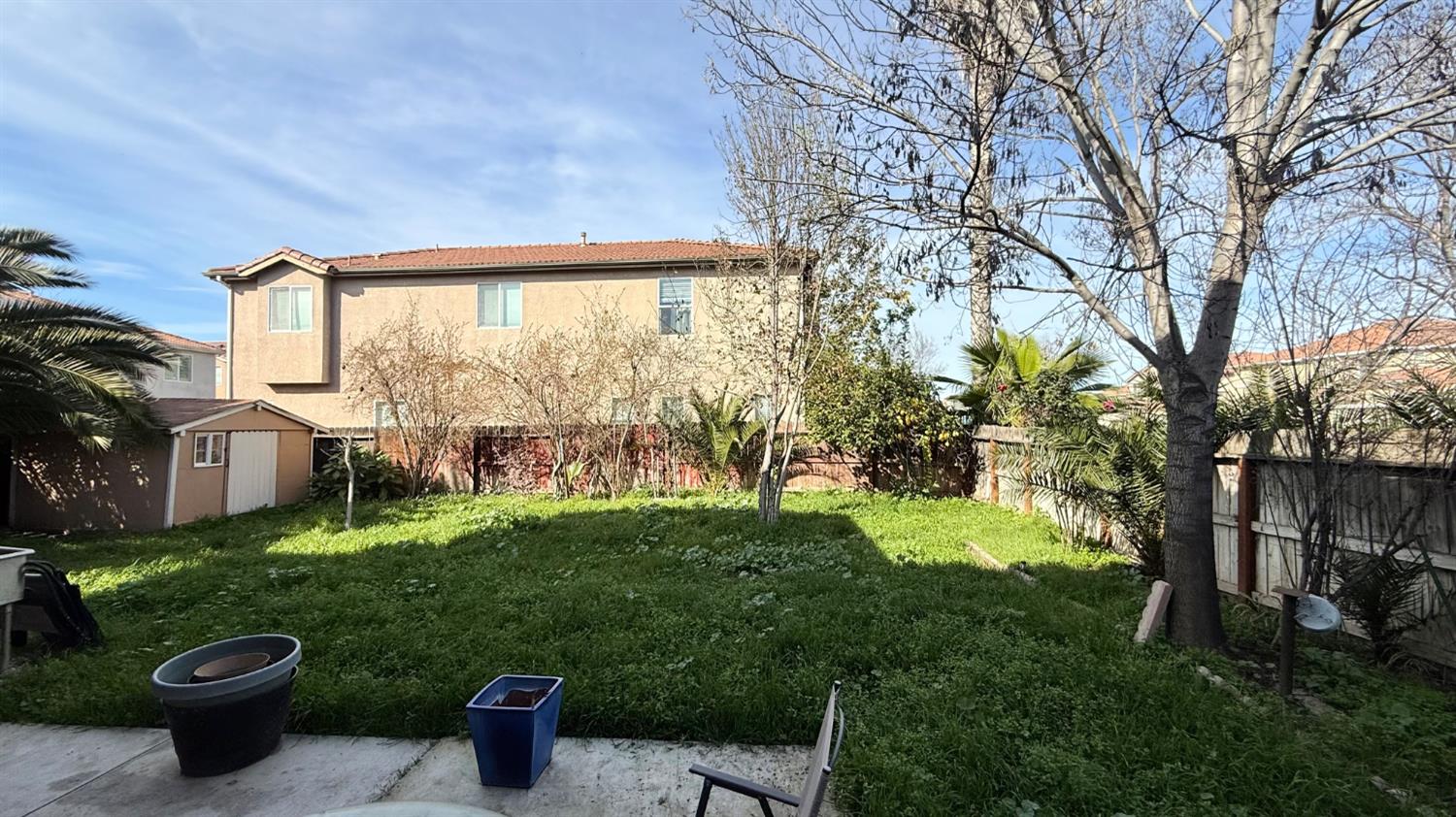 1416 San Rafael Street Los Banos, CA 93635 - Photo 21 of 21 a view of a garden with a large trees