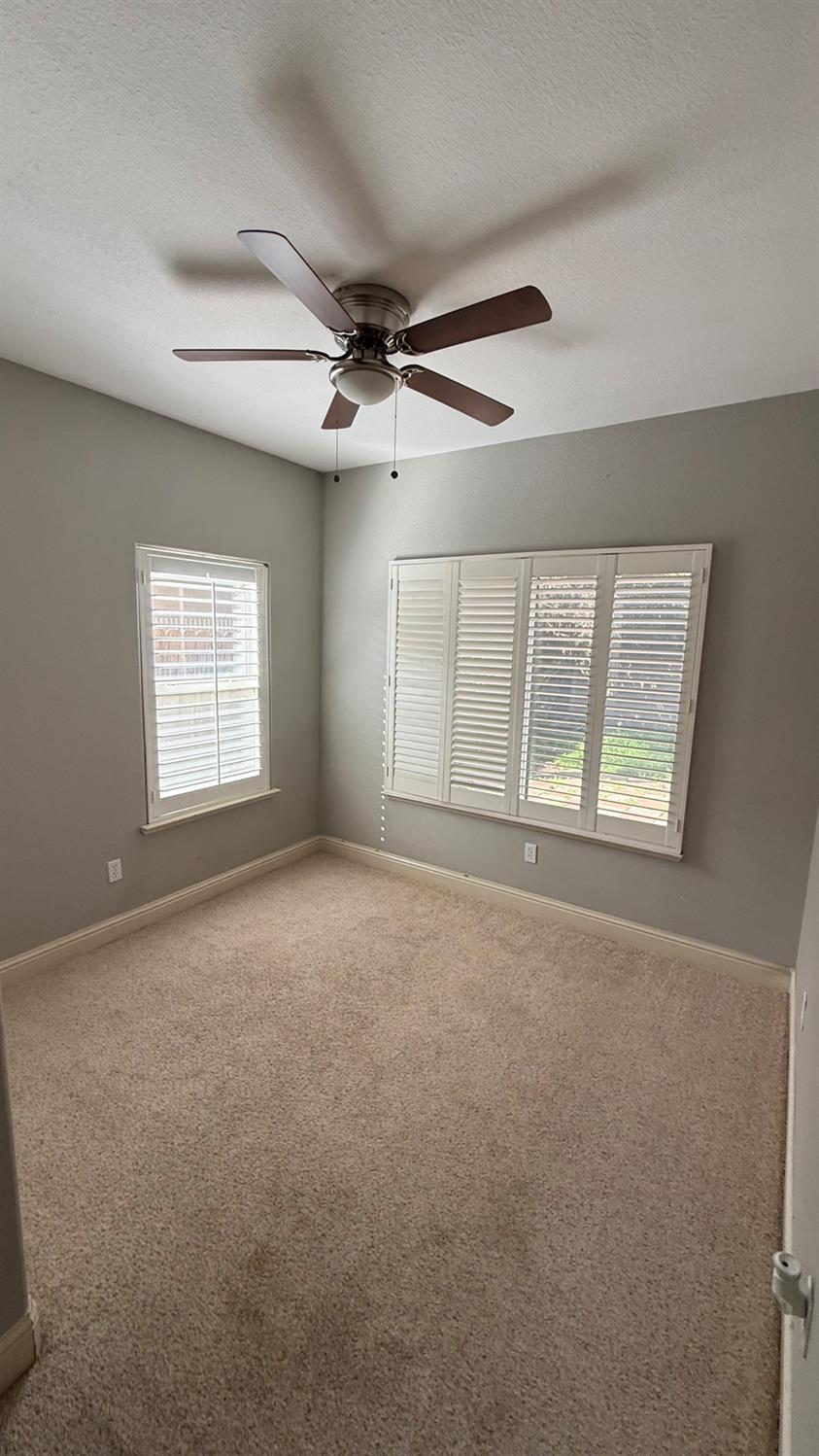 1416 San Rafael Street Los Banos, CA 93635 - Photo 9 of 21 a view of an empty room with a window