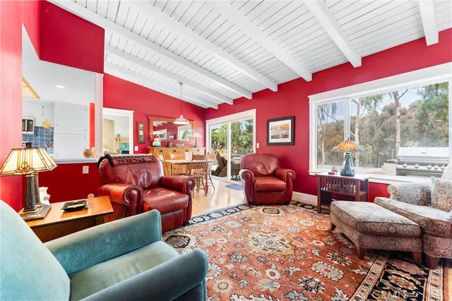 a bathroom with a toilet a sink and a mirror