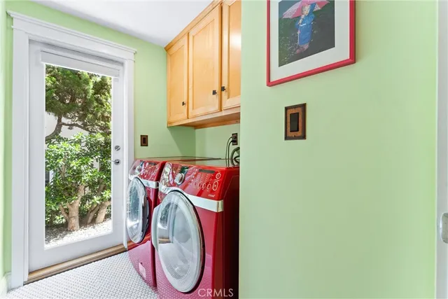 a view of a house with swimming pool and sitting area