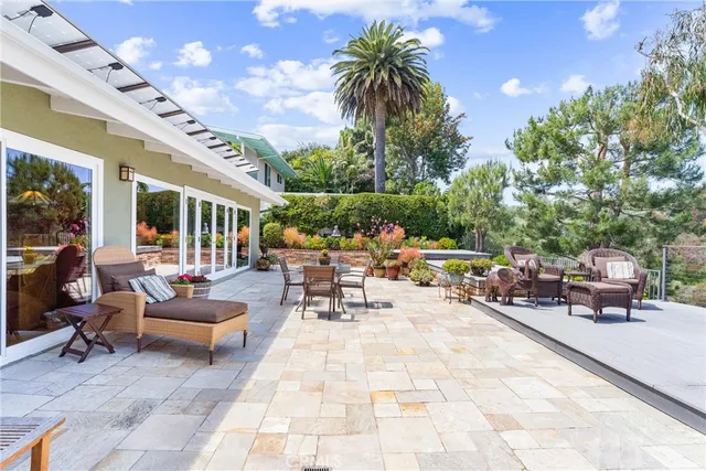 a view of a forest from a balcony