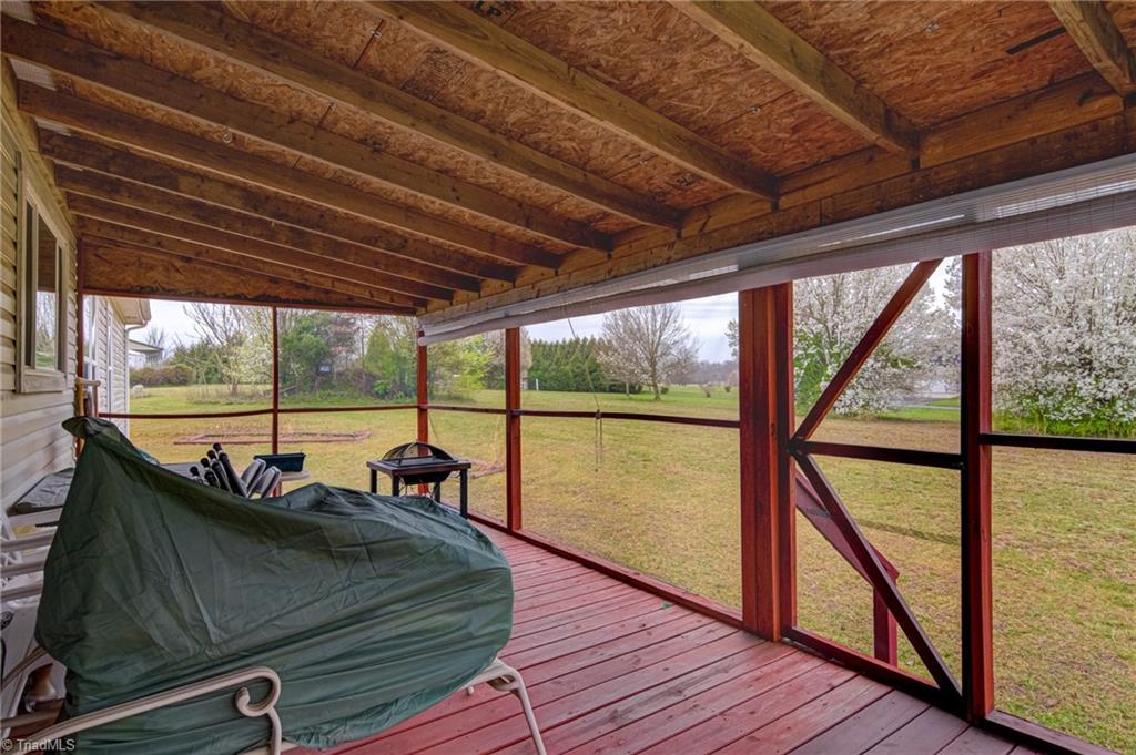 423 Brann Road Browns Summit, NC 27214 - Photo 20 of 34 Large Screened Porch