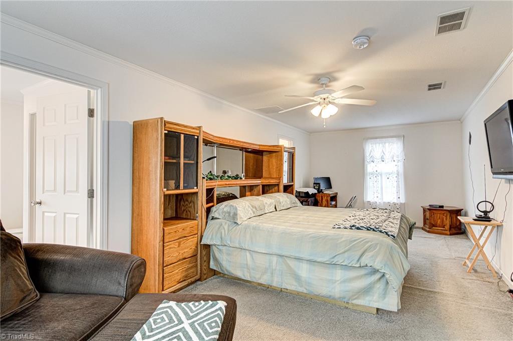 423 Brann Road Browns Summit, NC 27214 - Photo 21 of 34 Huge Primary Bedroom
