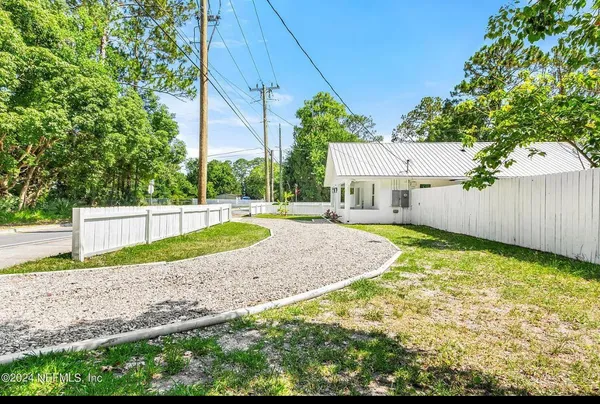 a house view with a garden space