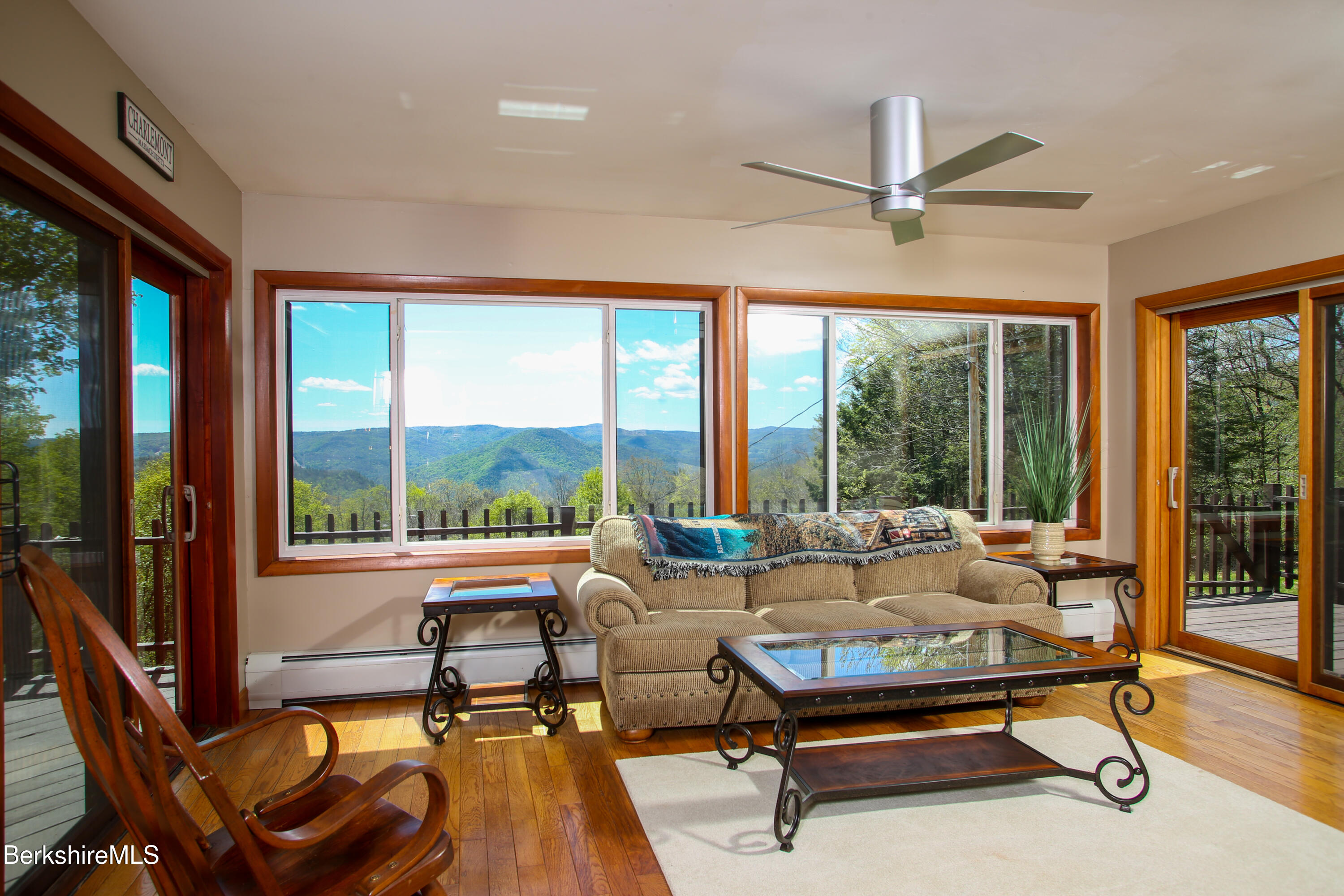 421 Legate Hill Road Charlemont, MA 01339 - Photo 4 of 37 a living room with furniture and a large window