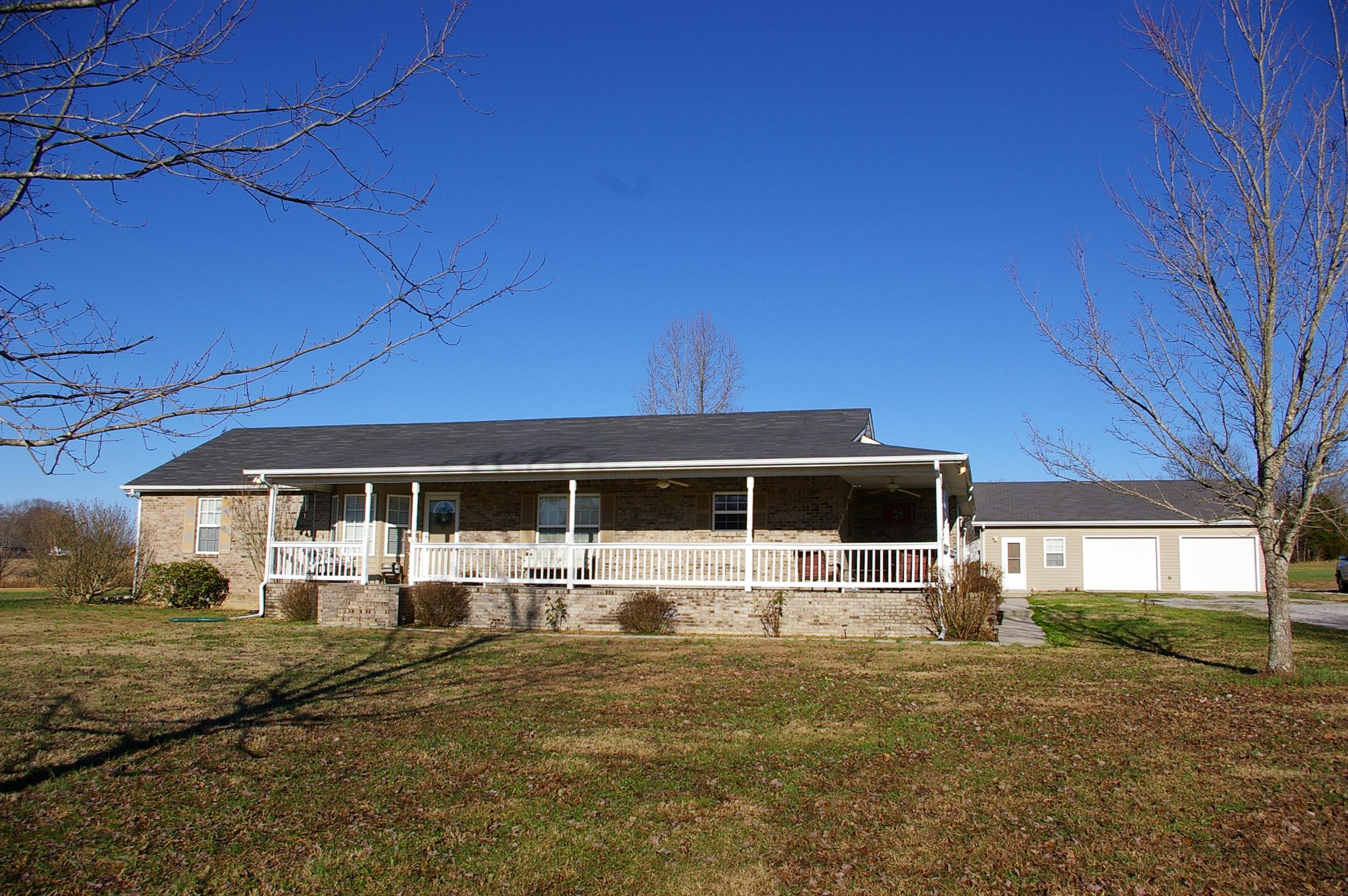 44 Old Pocahontas Road Manchester, TN 37355 - Photo 1 of 20 a front view of a house with a yard