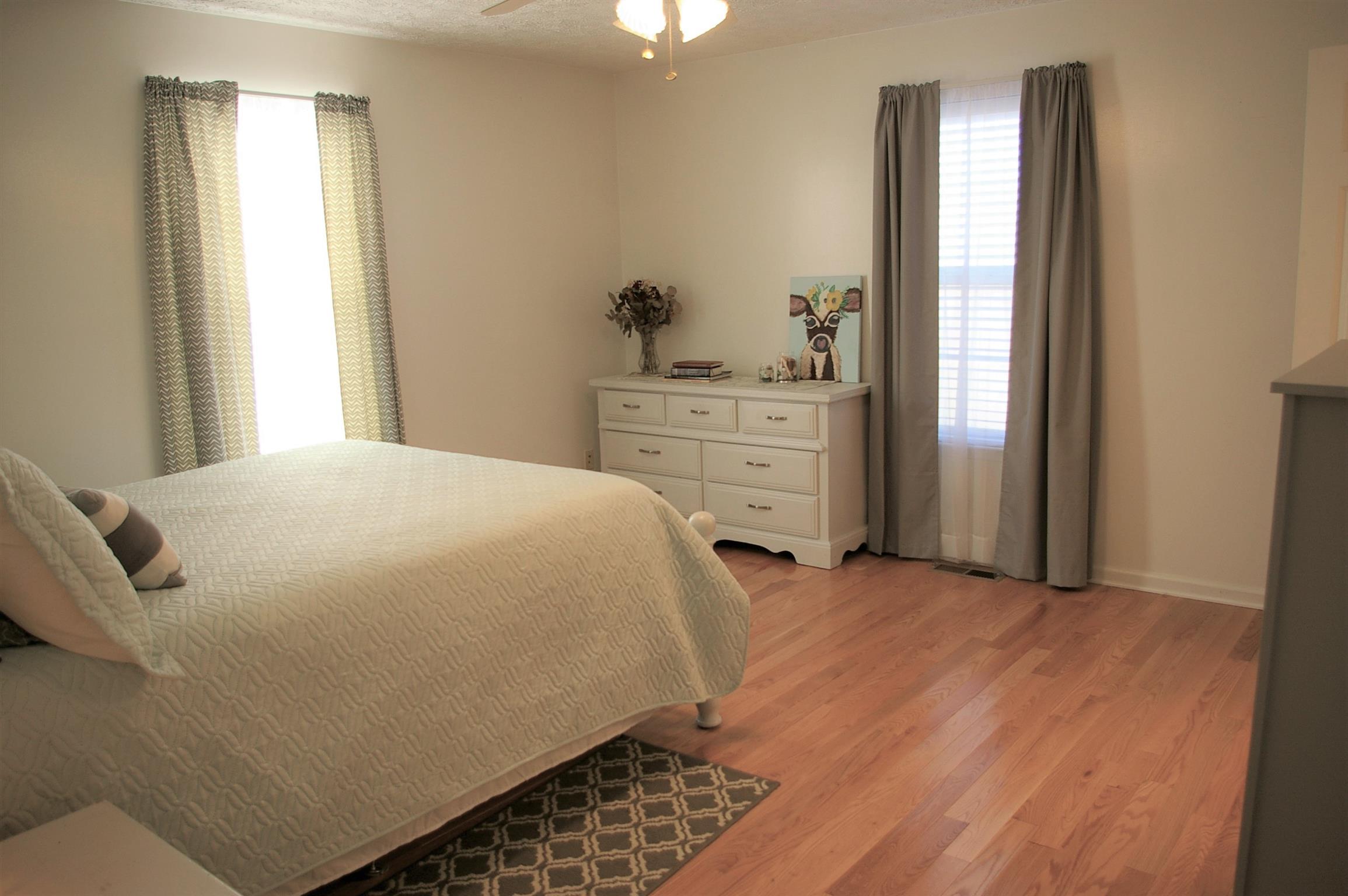 44 Old Pocahontas Road Manchester, TN 37355 - Photo 13 of 20 a bedroom with a bed and a dresser