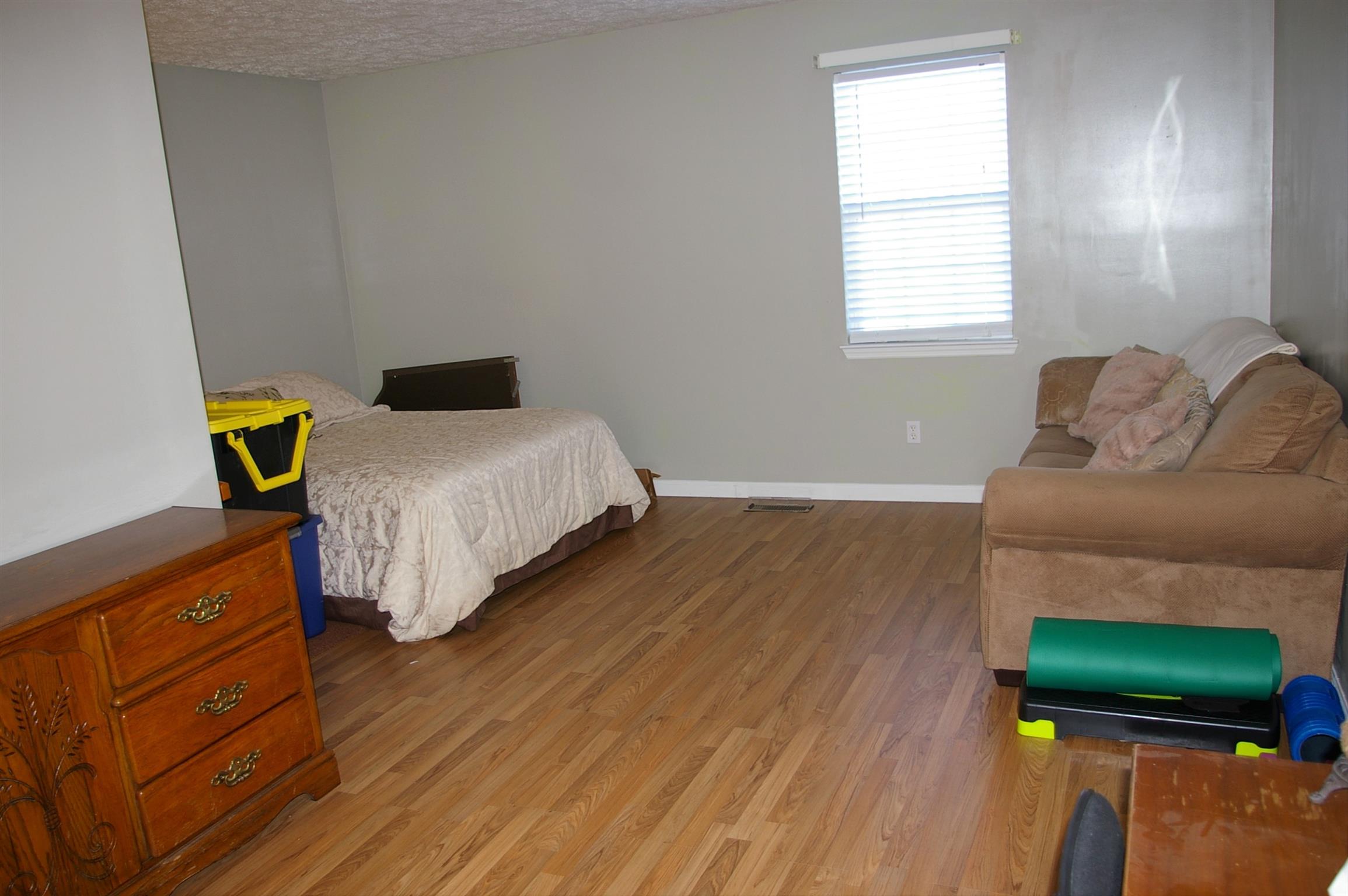 44 Old Pocahontas Road Manchester, TN 37355 - Photo 16 of 20 a bedroom with a bed and a window